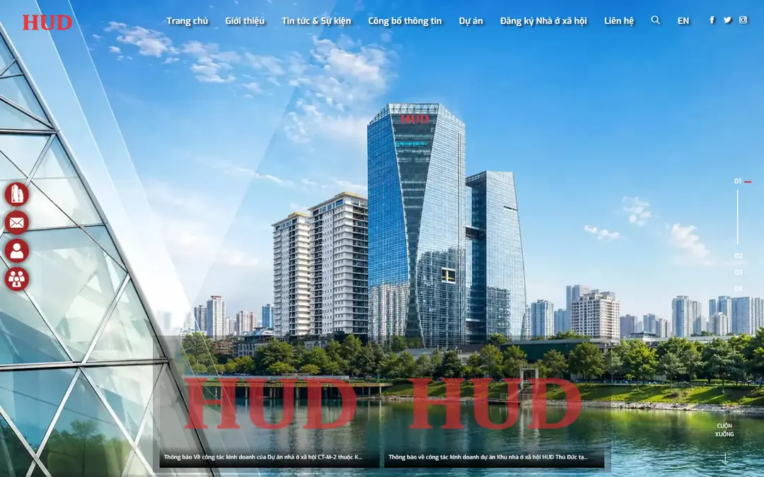 Trang chủ hud.com.vn: ảnh tòa tháp HUD bên hồ, menu có Công bố thông tin, Dự án, Đăng ký nhà ở xã hội, dải thông báo kinh doanh ở cuối màn
